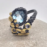 Sterling Silver Blue Topaz and tanzanite black rhodium gold ring